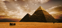 Famous Egyptian Pyramids with Sunset view and camels